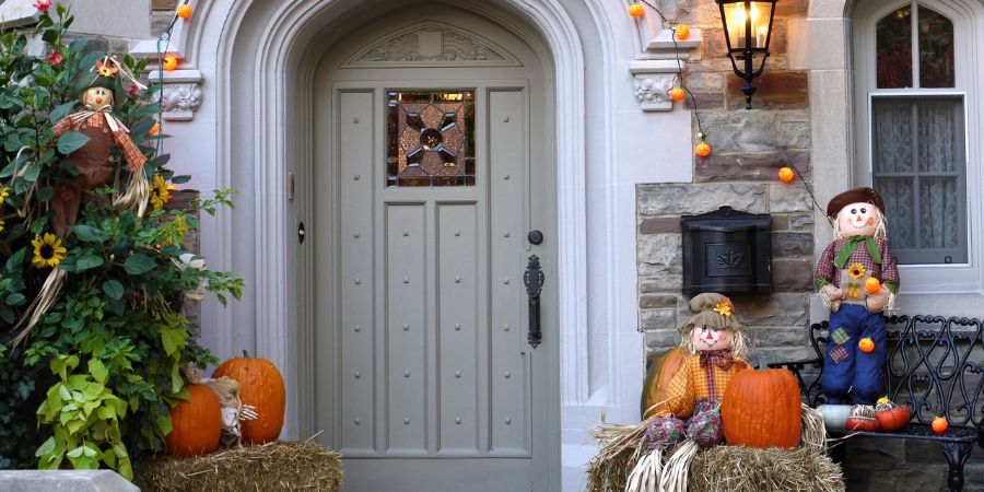 Front door with halloween design.